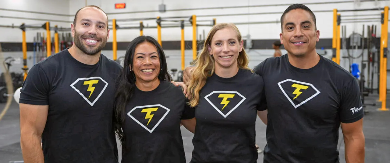 Team RepScheme coaches together in the gym